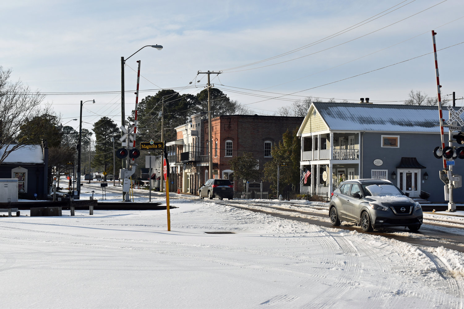 Madison’s Main Street is covered in a sheet of ice and snow in February following a massive ice storm.